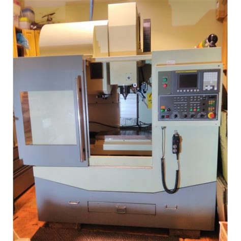 Used Sv 2412 Cnc Vertical Machining Center for sale. Sharp 